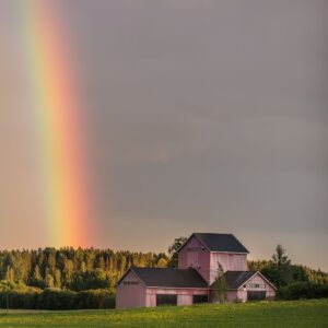 Rainbow Behind a Pink Farmhouse
